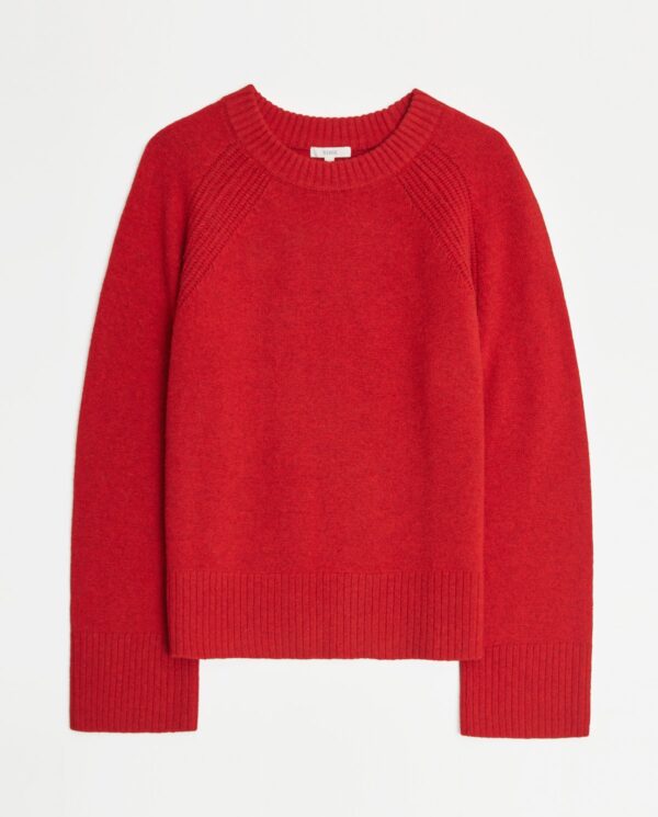 Maglione rosso con manica raglan polso lungo